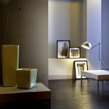 Modern interior with chrome lamp and frames